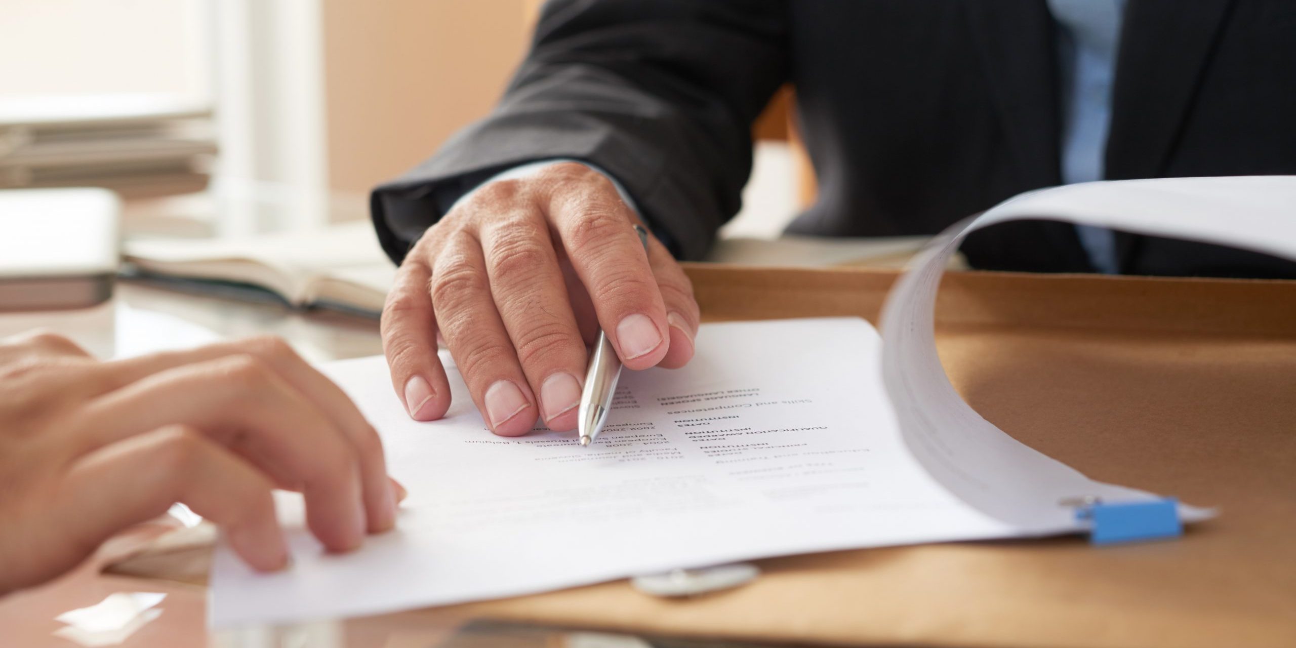 Business people signing a contract